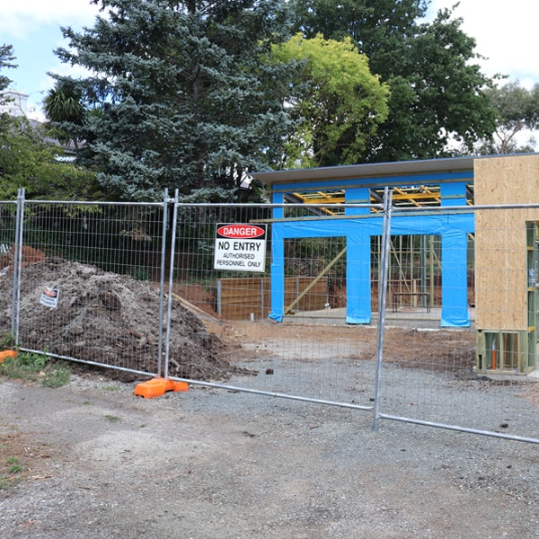 do you deliver and install temporary fencing and what's the price for these services in Hospers